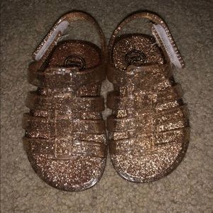 Baby gold glittery jelly shoes